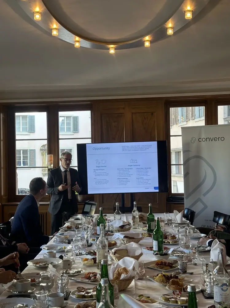 A speaker presenting at the ConveroConnect 2025 roundtable