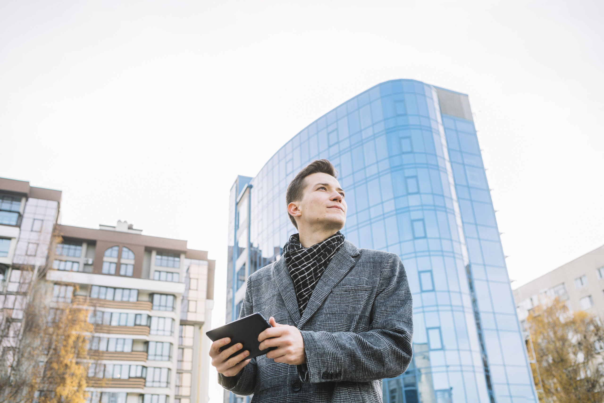 Home 2 businessman with tablet scaled